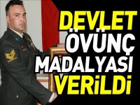 GAZİ KATRANCI´YA DEVLET ÖVÜNÇ MADALYASI VERİLDİ